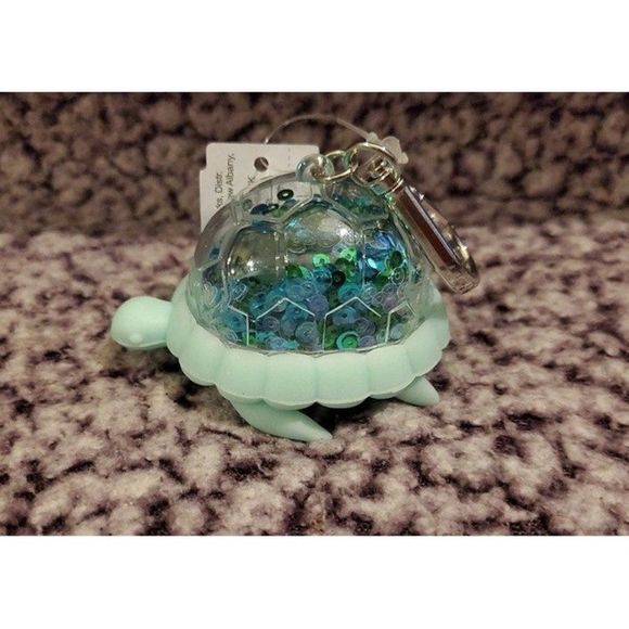 Bath & Body Works Green Irresedscent Sequin Turtle Pocketbac Holder - Picture 1 of 6